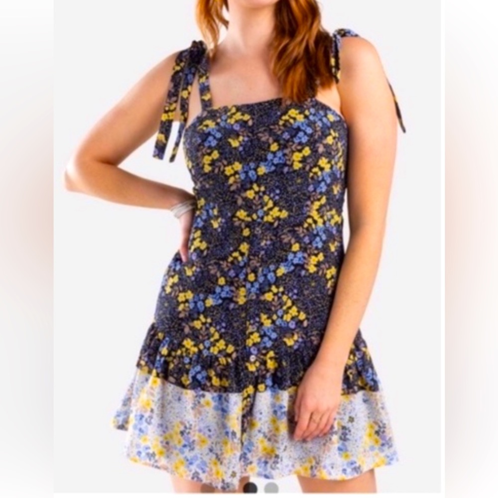 Francesca’s blue and yellow floral dress